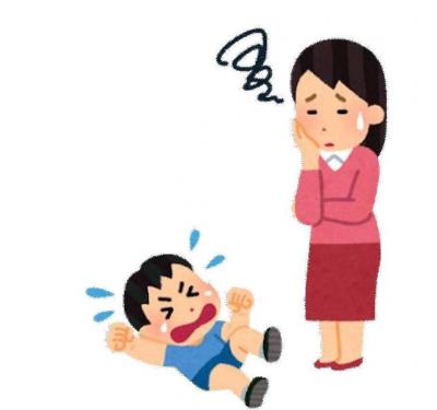 駄々をこねる子どもと母親